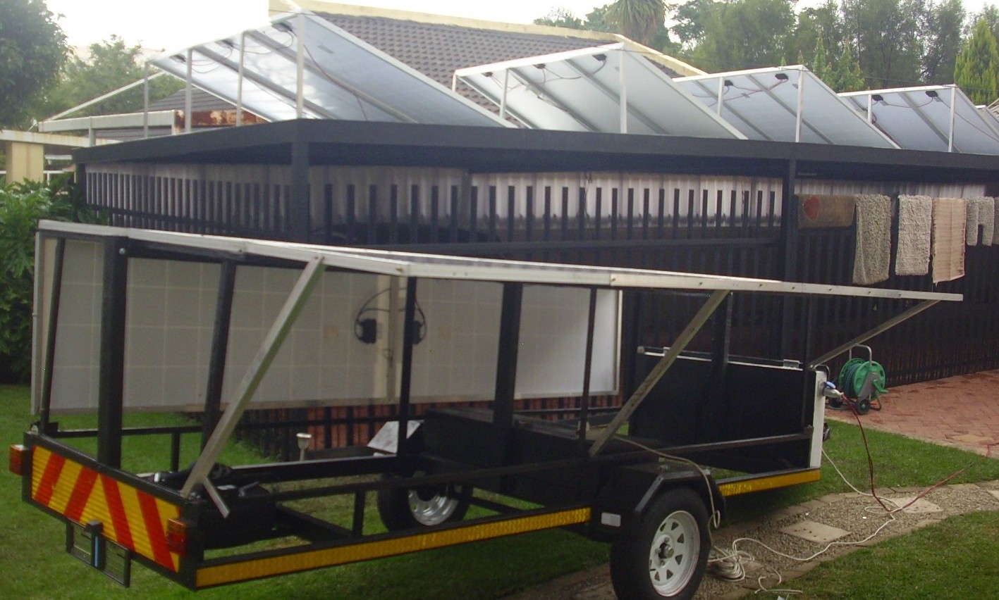 Custom mobile solar trailer with panels folded for transport